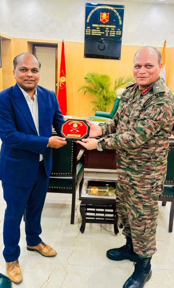 Rahul Laxman Patil receiving a commemorative plaque from a senior Indian Army officer at a formal headquarters engagement.